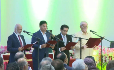 Millat promoted to full minister 