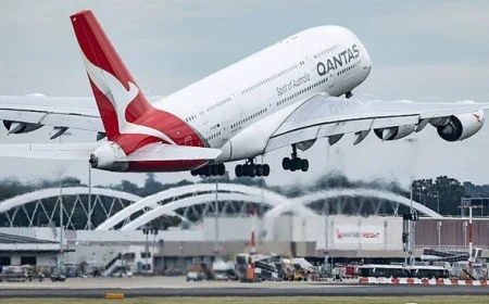 Man charged over alleged attempt to open Qantas plane door